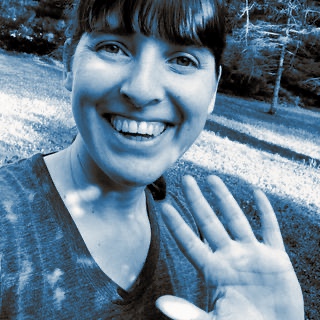 Jeanne Rewa waving hello